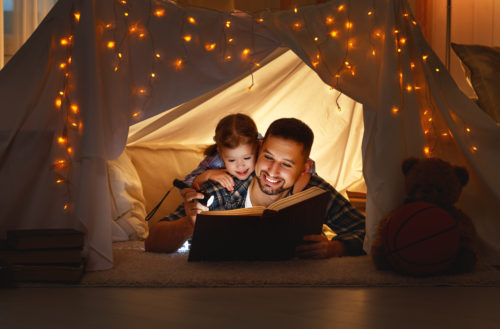 Dad and child reading